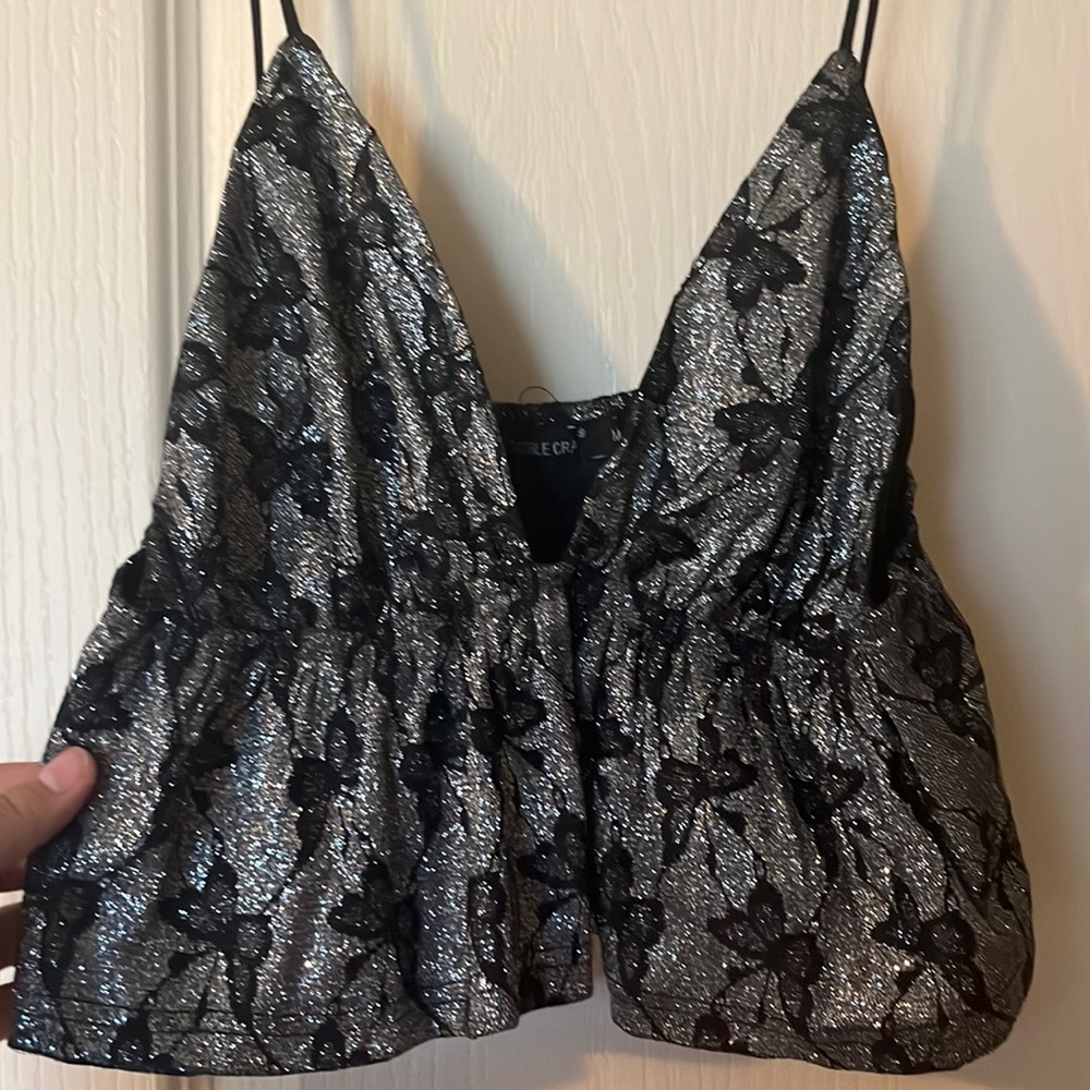 Gray and black tank with butterflies design and glitter.